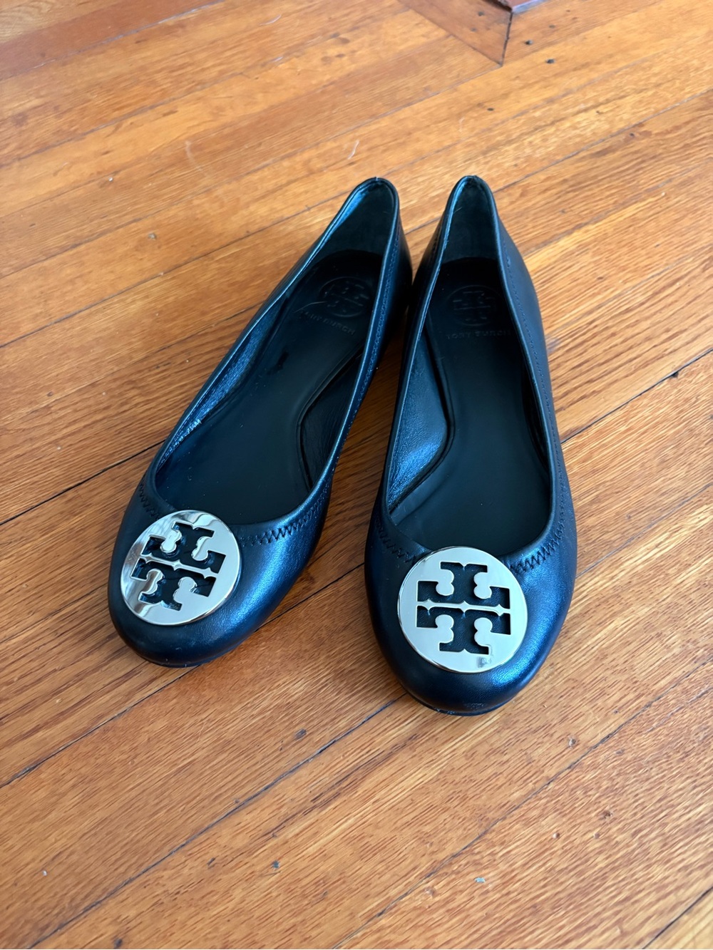Tory Burch Black Leather Flats with Silver Logo Medallion